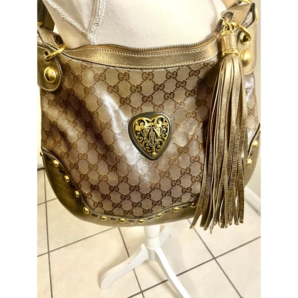 Gucci GG Signature and Studded Metallic Leather Babouska Hobo Bag.